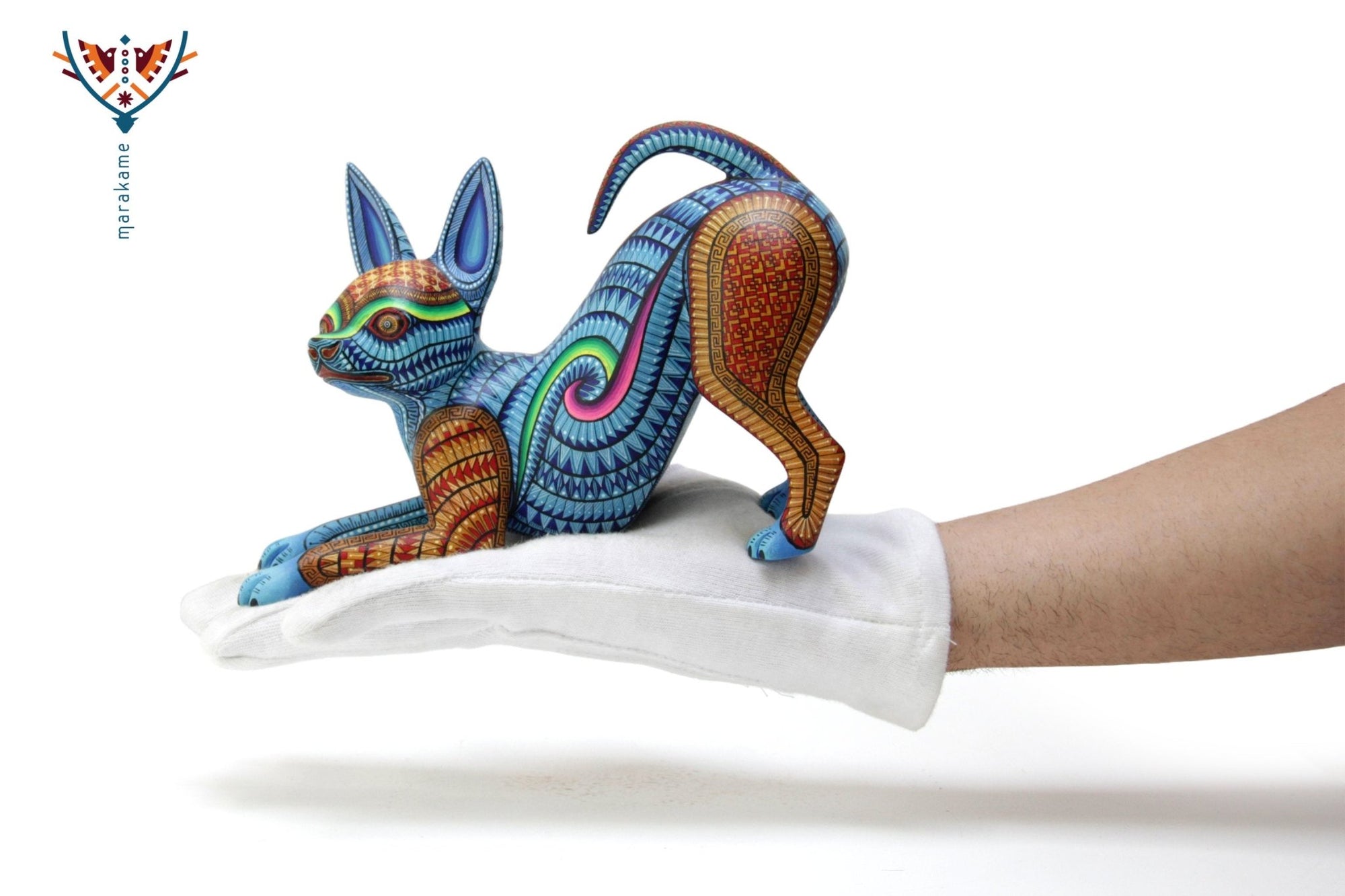 Alebrije - xoloitzcuintle estirándose - Arte Huichol - Marakame